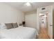 Comfortable bedroom with a closet, natural light, and neutral wall color at 6017 E Kathleen Rd, Scottsdale, AZ 85254