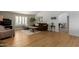 Spacious living room featuring hardwood floors, neutral walls, and an arched entrance at 6017 E Kathleen Rd, Scottsdale, AZ 85254