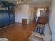 The living room features wood laminate flooring and a decorative lake mural at 6231 N 25Th Ave, Phoenix, AZ 85015