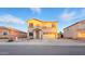 Charming two-story home with a two-car garage and desert landscaping at 6537 W Pioneer St, Phoenix, AZ 85043