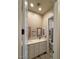 Bright bathroom with dual sinks, framed mirrors, and white cabinetry, offering a clean and modern design at 661 W Via De Palmas --, San Tan Valley, AZ 85140