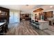 Open kitchen with an island, pendant lighting and view to dining and living areas at 661 W Via De Palmas --, San Tan Valley, AZ 85140