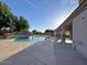 Outdoor patio area showcasing a large pool with rock features and ample space for lounging at 661 W Via De Palmas --, San Tan Valley, AZ 85140