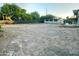 Large backyard space with potential for landscaping and outdoor activities, including a play structure at 753 W 6Th Dr, Mesa, AZ 85210