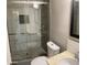 A bathroom featuring a glass door shower, with modern fixtures and marbled vanity at 753 W 6Th Dr, Mesa, AZ 85210