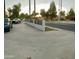 Expansive concrete driveway and attractive privacy wall enhance the curb appeal of this property at 753 W 6Th Dr, Mesa, AZ 85210
