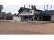 Exterior of home featuring a back patio and a built in grill at 753 W 6Th Dr, Mesa, AZ 85210