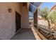 View of covered back patio with decorative lattice and concrete floor at 7621 S Bonarden Ln, Tempe, AZ 85284