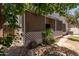 Backyard features a covered patio and desert landscaping at 7621 S Bonarden Ln, Tempe, AZ 85284