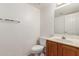 A half bathroom with single sink vanity is displayed at 7621 S Bonarden Ln, Tempe, AZ 85284