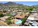 Aerial view of a desert home with a private pool and mountain views at 811 E Brown St, Phoenix, AZ 85020