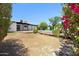 Large backyard with lush trees and a sparkling pool at 811 E Brown St, Phoenix, AZ 85020