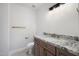 Elegant bathroom with granite countertop and modern fixtures at 811 E Brown St, Phoenix, AZ 85020
