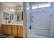 Bathroom featuring a dual sink vanity and shower at 8769 W Washington St, Tolleson, AZ 85353