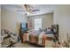 Bedroom with ceiling fan and window at 8769 W Washington St, Tolleson, AZ 85353