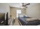 Cozy bedroom with ceiling fan and closet at 8769 W Washington St, Tolleson, AZ 85353