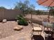 Paver patio with rock landscaping and views of the surrounding desert landscape at 9141 W Dreyfus Dr, Peoria, AZ 85381