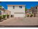 Charming two-story home with a two car garage and brick paved driveway at 10062 E Isleta Ave, Mesa, AZ 85209