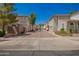 Charming homes lining brick paved streets with manicured landscaping and mature trees at 10062 E Isleta Ave, Mesa, AZ 85209