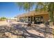 Spacious backyard featuring a brick paved patio, in-ground hot tub, and open space at 1032 E Dolores Rd, Phoenix, AZ 85086