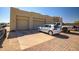 Wide driveway with parking spaces showcasing multiple vehicles, providing convenient and ample parking for residents and guests at 1032 E Dolores Rd, Phoenix, AZ 85086