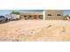 Front exterior with extended parking and drive featuring desert landscaping with native vegetation, offering curb appeal and easy maintenance at 1032 E Dolores Rd, Phoenix, AZ 85086