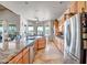Well-appointed kitchen featuring stainless steel appliances, granite countertops, and ample cabinet space at 1032 E Dolores Rd, Phoenix, AZ 85086