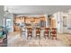 Spacious kitchen featuring granite countertops, ample cabinet space, and an inviting breakfast bar at 1032 E Dolores Rd, Phoenix, AZ 85086