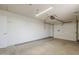 Spacious two-car garage with automatic door and built-in storage cabinets at 11133 W Cameo Dr, Sun City, AZ 85351