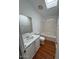 Bathroom has a single sink vanity, tile shower over tub, and a skylight at 11596 W Sierra Dawn Blvd # 372, Surprise, AZ 85378