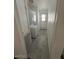 Laundry room features stackable washer/dryer and tiled flooring at 11596 W Sierra Dawn Blvd # 372, Surprise, AZ 85378