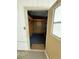 Small storage shed has a window and a wooden shelf inside at 11596 W Sierra Dawn Blvd # 372, Surprise, AZ 85378