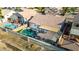Aerial view of backyard, highlighting the pool, patio, and manicured landscaping at 11622 W Palm Brook Dr, Avondale, AZ 85392