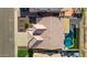 Aerial view of tile roof over a single-Gathering home, featuring backyard pool and desert landscaping at 11622 W Palm Brook Dr, Avondale, AZ 85392