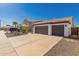 Lovely house features a three car driveway, desert landscaping, and great curb appeal at 11622 W Palm Brook Dr, Avondale, AZ 85392