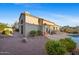Backyard with a built-in barbecue, outdoor seating, and access to the refreshing pool at 11816 E Terra Dr, Scottsdale, AZ 85259