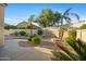 Private backyard featuring desert landscaping and a concrete patio, perfect for relaxing and entertaining at 11816 E Terra Dr, Scottsdale, AZ 85259