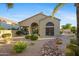 Home exterior features a landscaped backyard with a small pool at 11816 E Terra Dr, Scottsdale, AZ 85259