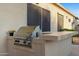 Outdoor barbecue with countertop space, perfect for grilling and entertaining in the backyard at 11816 E Terra Dr, Scottsdale, AZ 85259