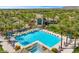 Community pool and amenities including chairs and umbrellas at 11816 E Terra Dr, Scottsdale, AZ 85259