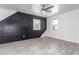 Bedroom featuring accent wall, ceiling fan, and light gray floors at 13012 N 36Th Dr, Phoenix, AZ 85029