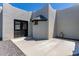 Exterior view of home with stucco walls, accent window, and gravel yard at 13012 N 36Th Dr, Phoenix, AZ 85029