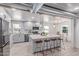 Stylish kitchen with modern appliances, breakfast bar seating and subway tile backsplash at 13012 N 36Th Dr, Phoenix, AZ 85029