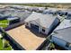 Aerial view of backyard, roof, and neighborhood showcasing privacy at 13619 W Hackamore Dr, Peoria, AZ 85383