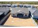 Aerial view of backyard, roof, and surrounding neighborhood at 13619 W Hackamore Dr, Peoria, AZ 85383