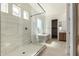 Beautiful bathroom featuring an elegant glass shower and soaking tub at 13619 W Hackamore Dr, Peoria, AZ 85383