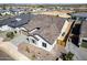 Aerial view of a charming home with a well-maintained front yard and neutral color palette at 13619 W Hackamore Dr, Peoria, AZ 85383