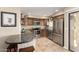 Well-equipped kitchen includes stainless steel appliances, tile backsplash, and granite countertops at 1401 E Puget Ave # 10, Phoenix, AZ 85020