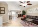 Bright living room offering tile flooring, an open layout, and seamless access to the kitchen at 1401 E Puget Ave # 10, Phoenix, AZ 85020