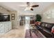 Inviting living room boasts tile flooring, a ceiling fan, and comfortable seating at 1401 E Puget Ave # 10, Phoenix, AZ 85020